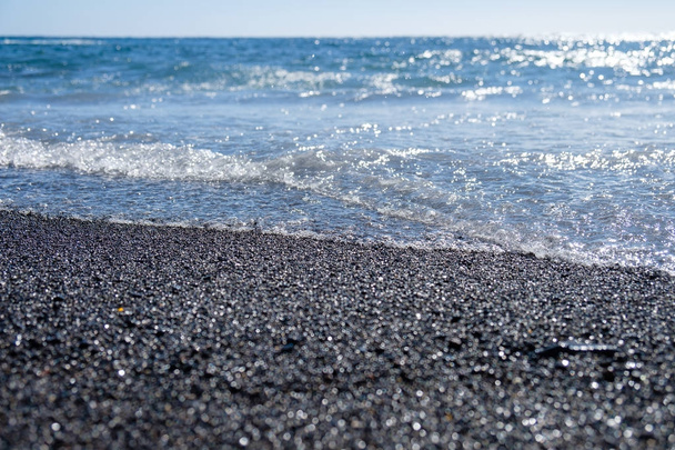 Ocean Woda i piasek czarny - Zdjęcie, obraz