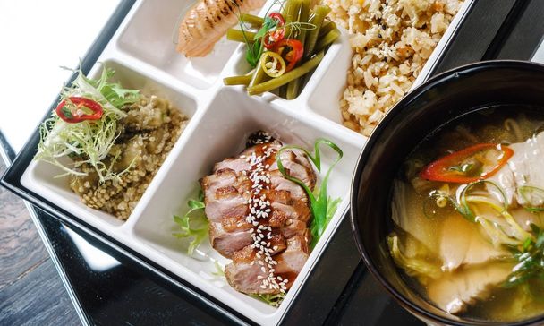 bento box and soup - Foto, afbeelding