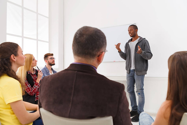 African-american man doing presentation in office - Photo, Image