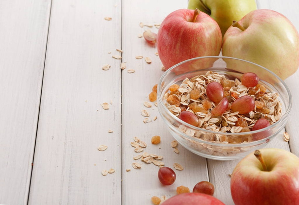 Healthy morning meals with muesli and apples - 写真・画像