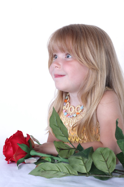 Little girl with flower - Foto, afbeelding