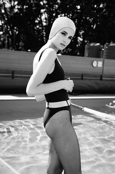 woman  posing near swimming pool - Photo, image