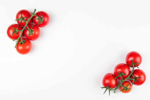 Tomato on the white background. Healthy food. Tomatoes on white background. Top view - Foto, imagen