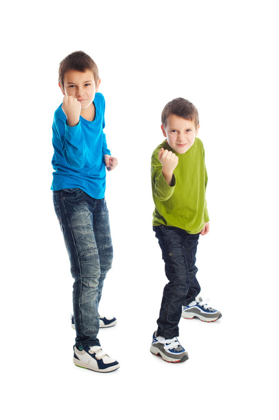 Two boys in a fighting stance. - Foto, afbeelding