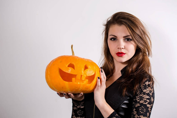 girl holding a pumpkin - Φωτογραφία, εικόνα