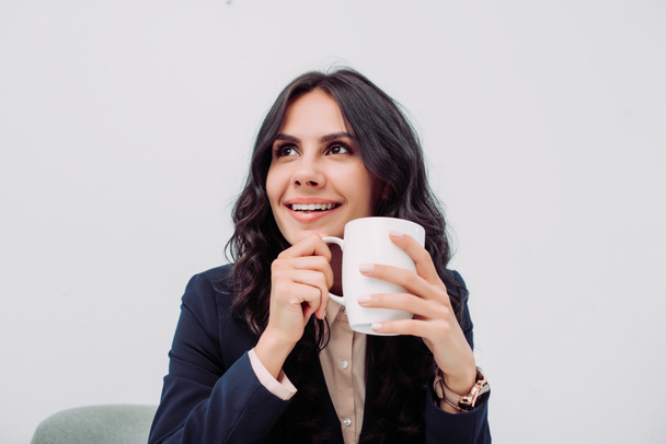 businesswoman with cup of hot drink - Fotografie, Obrázek
