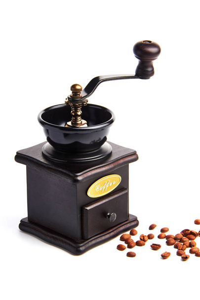 コーヒー豆とハンドグラインダー. - 写真・画像