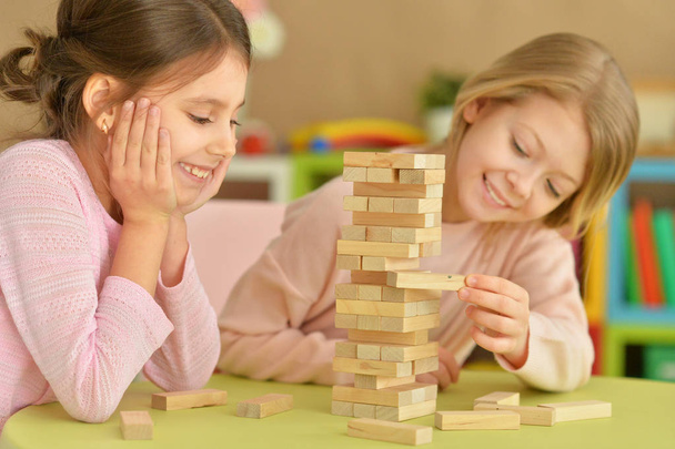 little girls playing with blocks - Фото, зображення