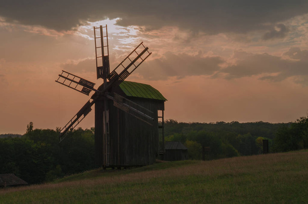 old mill on the sky background - 写真・画像
