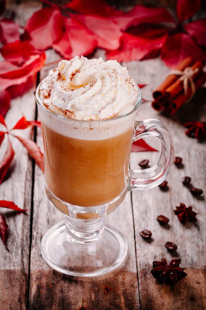 pumpkin latte with whipped cream in a glass jar  - Foto, Imagem
