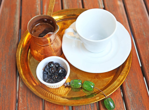 traditional greek coffee with coffee pot, sweet cherry and rosary - Zdjęcie, obraz