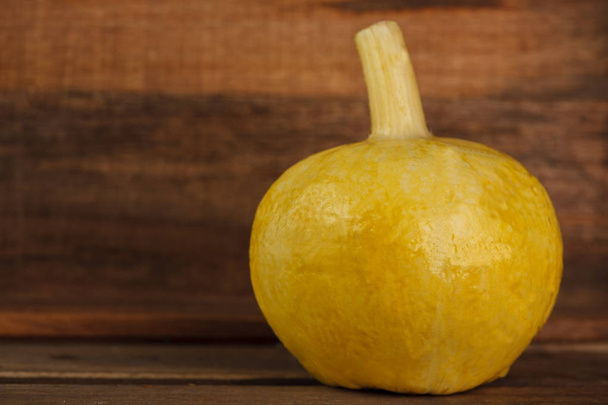 yellow pumpkins on wooden background - Photo, image