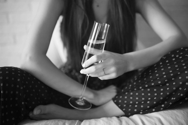 young woman with champagne  - Photo, Image