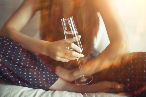young woman with champagne  - 写真・画像