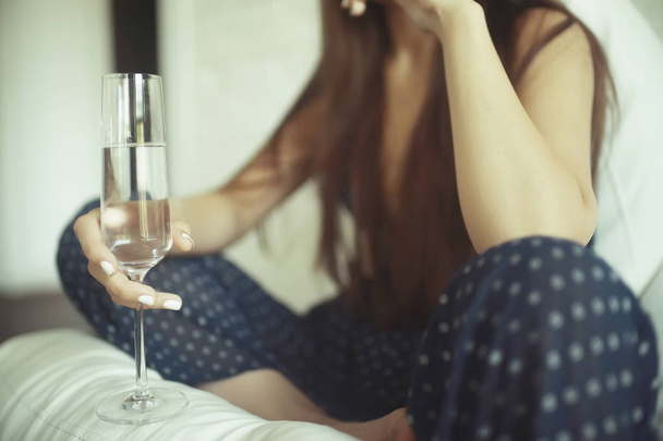 beautiful young woman with champagne  - 写真・画像