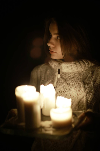 young woman with candles  - Valokuva, kuva