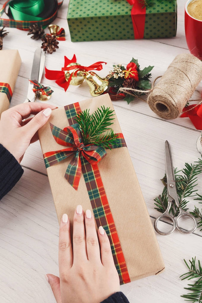 Gift wrapping. Packaging modern christmas present in boxes - Foto, immagini