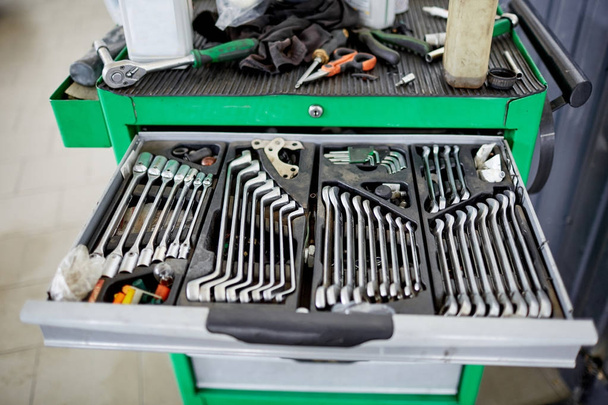 A set of tools in a box used by mechanics - Photo, image