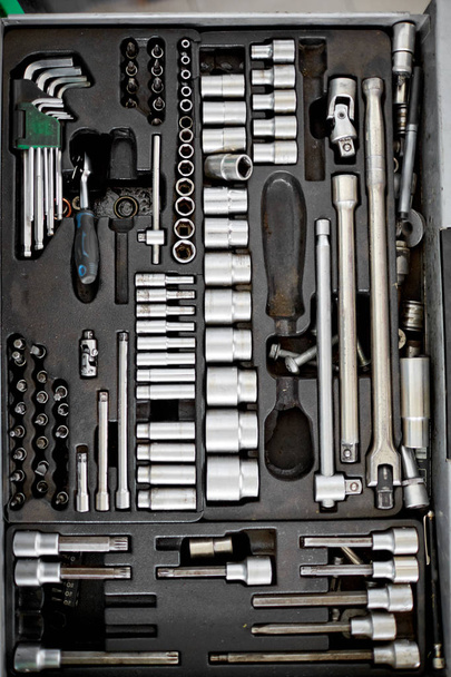 Green box with tools for mechanics close-up - Fotó, kép