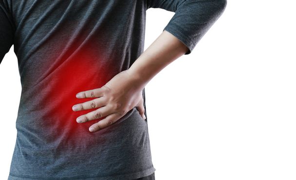 young man Feeling suffering  Lower back pain  Pain relief concep - Foto, Bild