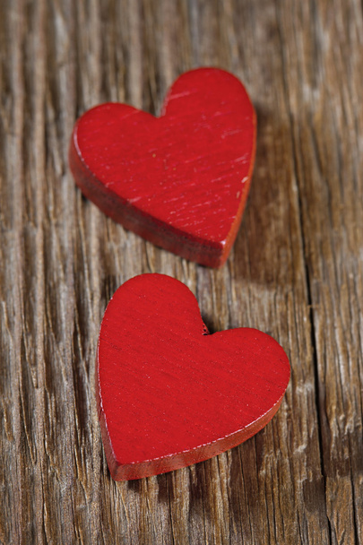 Red hearts on wooden background - Photo, Image