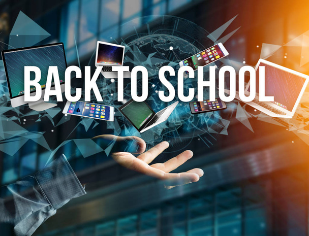 Back to school title surrounded by devices - 写真・画像