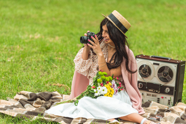 stylish girl with camera in park - Photo, Image
