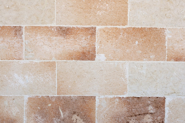 Pared con bloques de arenisca típicos de Puglia
 - Foto, imagen