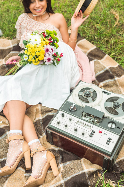 girl with flowers and tape recorder - Photo, Image