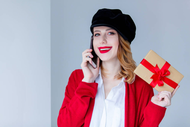 Woman in hat with gift box - Photo, Image
