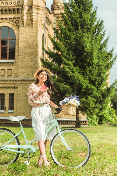girl with watermelon and bicycle - Фото, зображення
