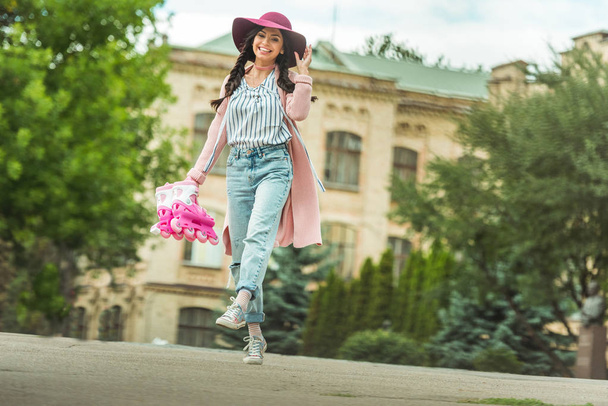 happy girl with roller skates - Foto, Imagem