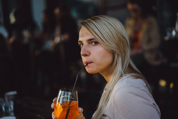 Woman drinking cocktail - Photo, image