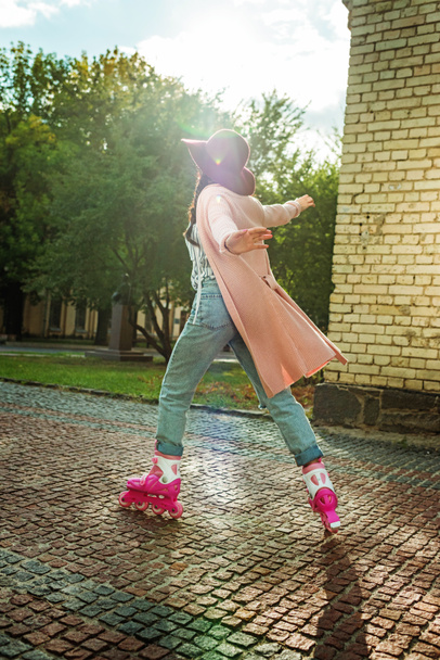 stylish girl in roller skates - Фото, зображення