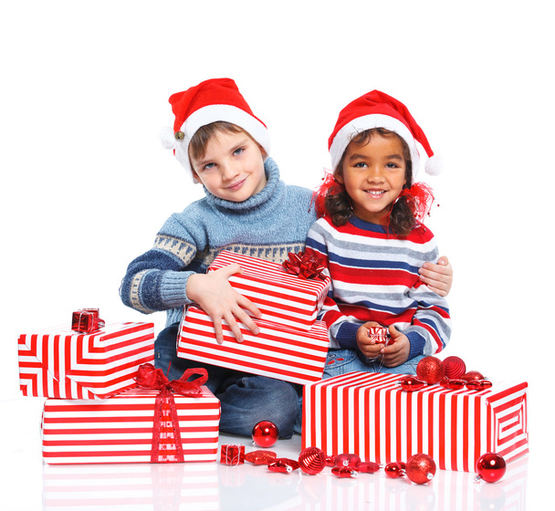 Little kids in Santa's hat with gift box - Fotoğraf, Görsel
