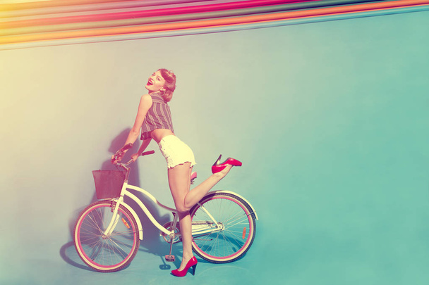 young woman with bicycle - Photo, image