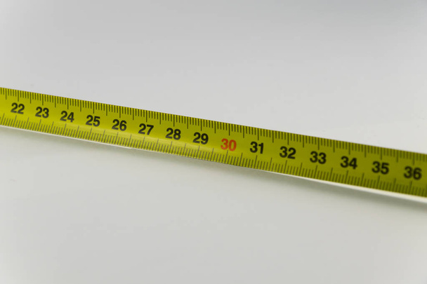 Yellow Measure Tape,  Centimeter. Measure Tool Equipment. Backgr - Photo, Image