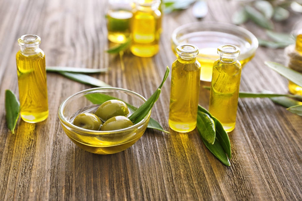 Glassware with olive oil   - Фото, изображение