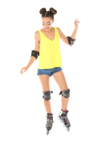 young woman on roller skates - 写真・画像