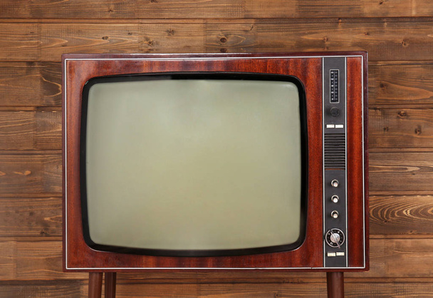 Retro TV on wooden  - Foto, afbeelding