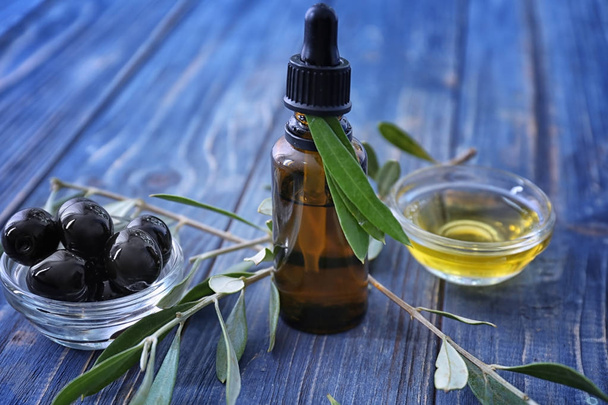 Glass bottle with olive oil  - Photo, image