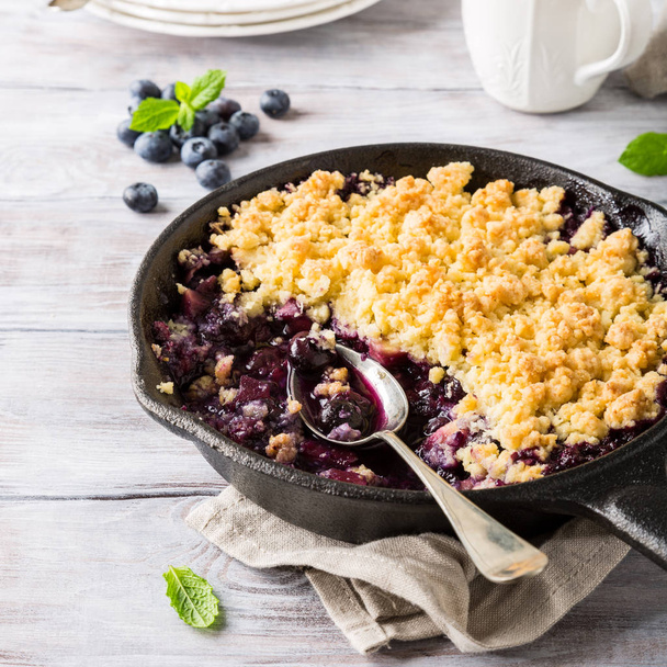 Coconut crumble in cast iron pan - Photo, Image