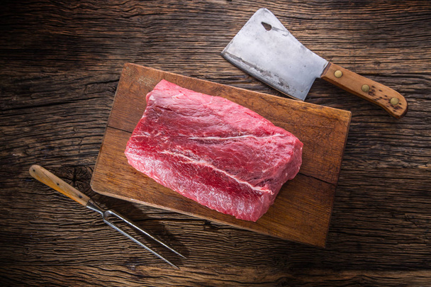Beef Steak. Raw beef steak. Big Rib Eye steak on wooden board - Фото, зображення