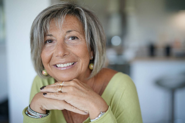 smiling senior woman at home  - Foto, Imagen