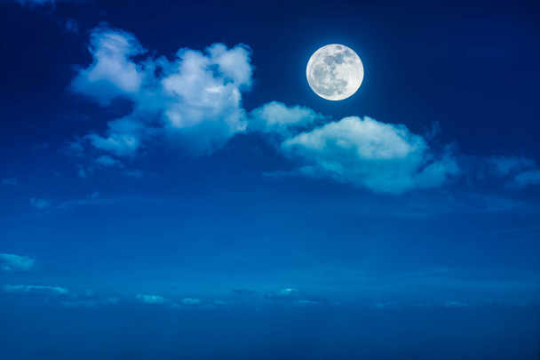Landscape of night sky with beautiful full moon, serenity nature background. - Photo, Image