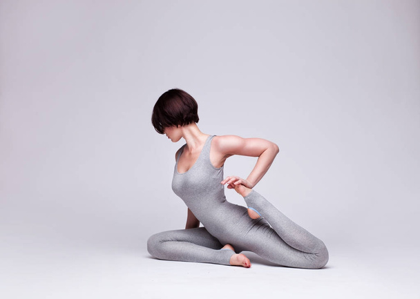 young beautiful woman yoga posing - Zdjęcie, obraz