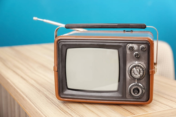 Old vintage TV on wooden table - Fotografie, Obrázek
