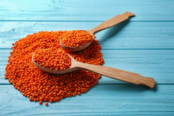 Spoons with healthy lentils  - Фото, изображение