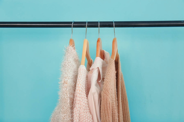 Apricot and beige clothes on hangers  - Foto, Imagem