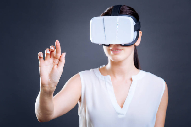 Attractive young businesswoman testing 3d technology - Foto, Imagen